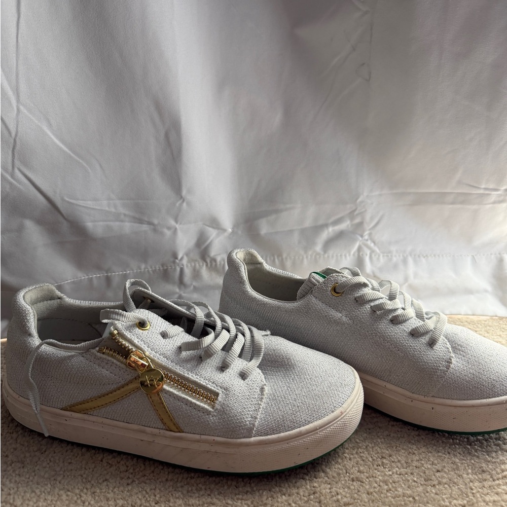 Silver sparkle Kokolu Sneakers with green sole. Size 6
